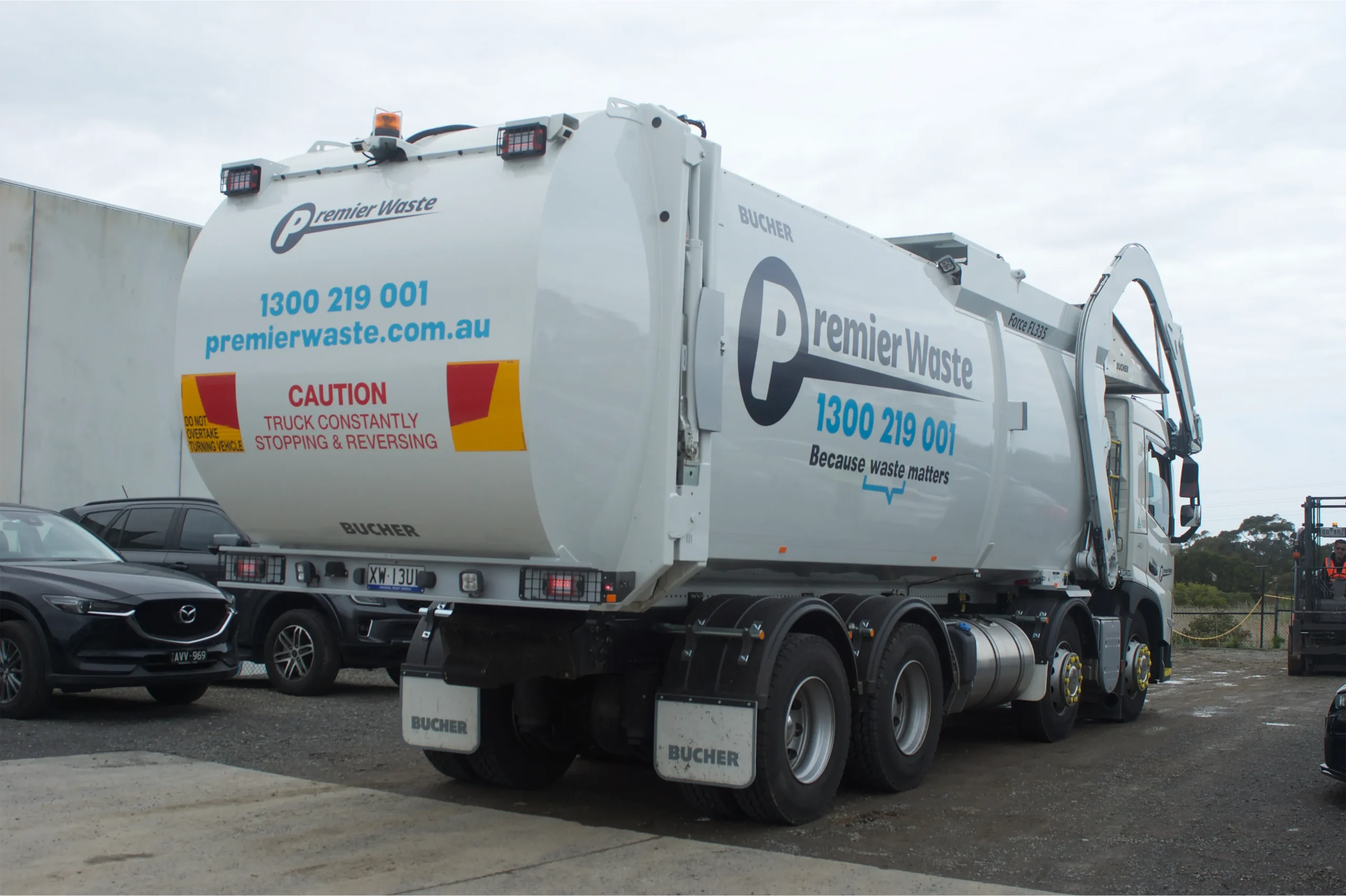 premierwaste_rearlift bin truck Waste management rear lift truck operated by Premier Waste